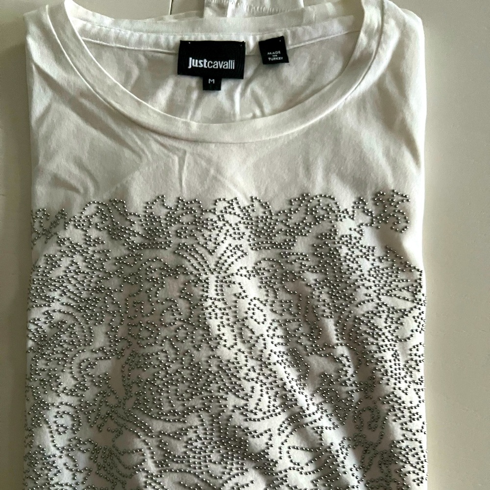 Brand:Just Cavalli color:white. White shirt with a animal print